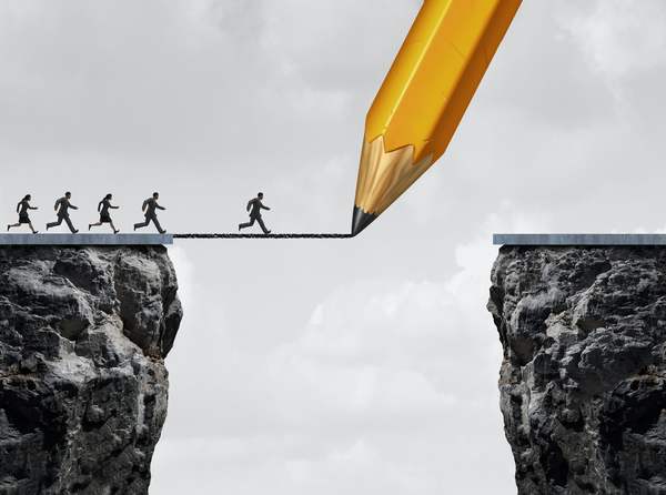 Stock photo drawing a bridge and conquering adversity business concept as a group of people running from one 347537057