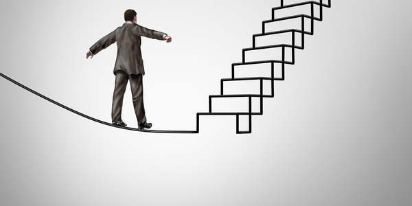Man standing in front of staircase